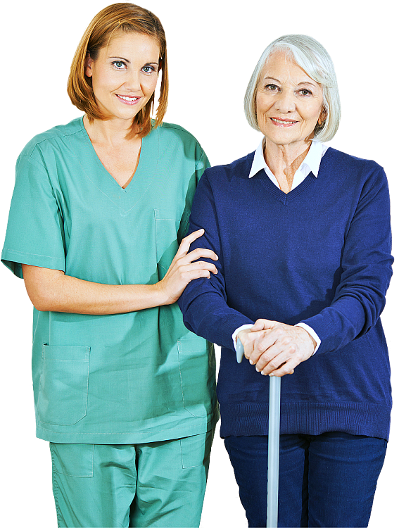 aide standing with senior woman