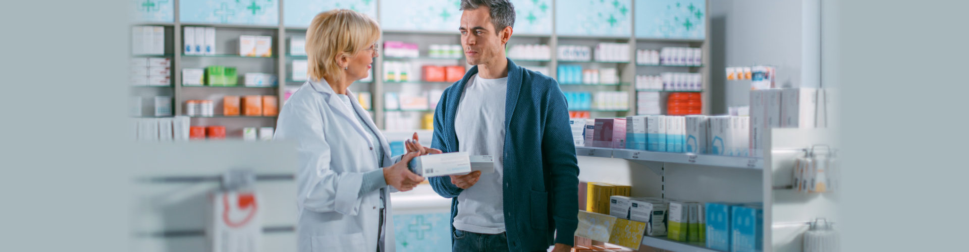 pharmacist talks with client