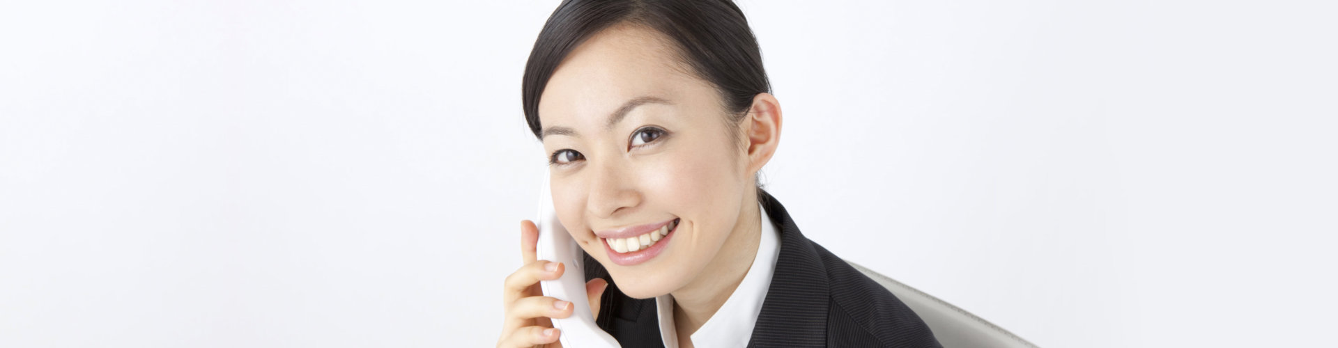 woman on the phone smiling